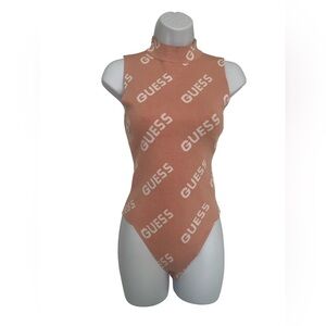 Guess Logo Bodysuit in Pink and White Size: M. Great Condition.